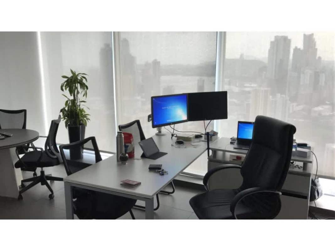 Flexible open office area with city skyline backdrop in Oceania Business Plaza Panama City