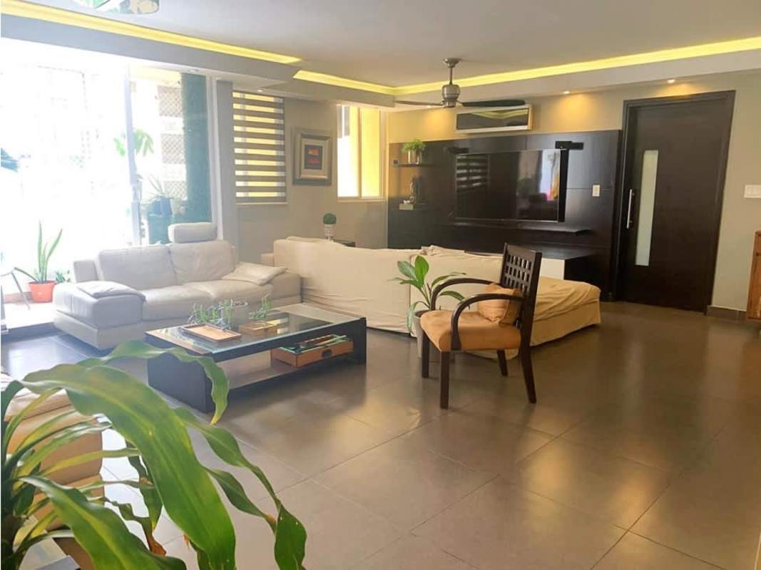 Bright living room modern furniture large windows city views PH Sophia Towers Obarrio Panama