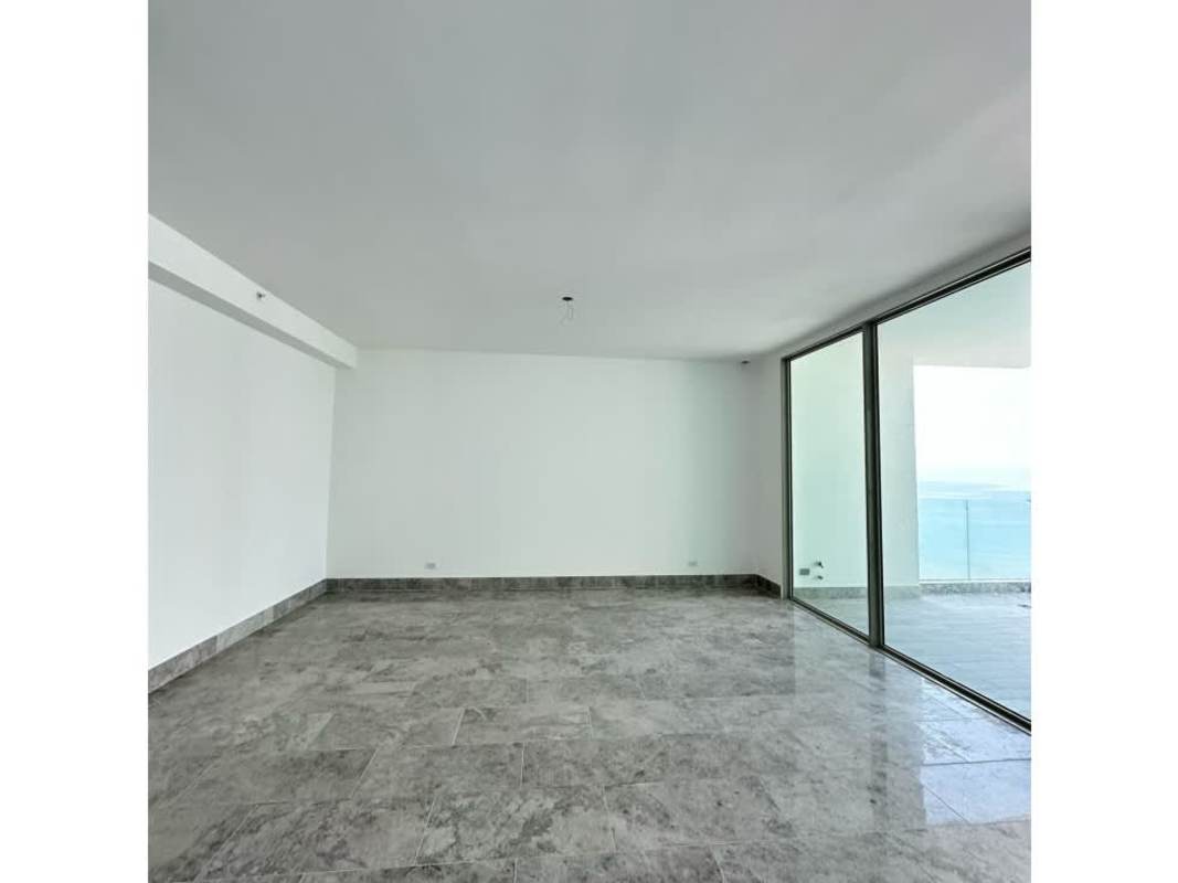 Spacious marble floor living area with floor-to-ceiling windows and panoramic Pacific Ocean views at Pacific Point Tower 400