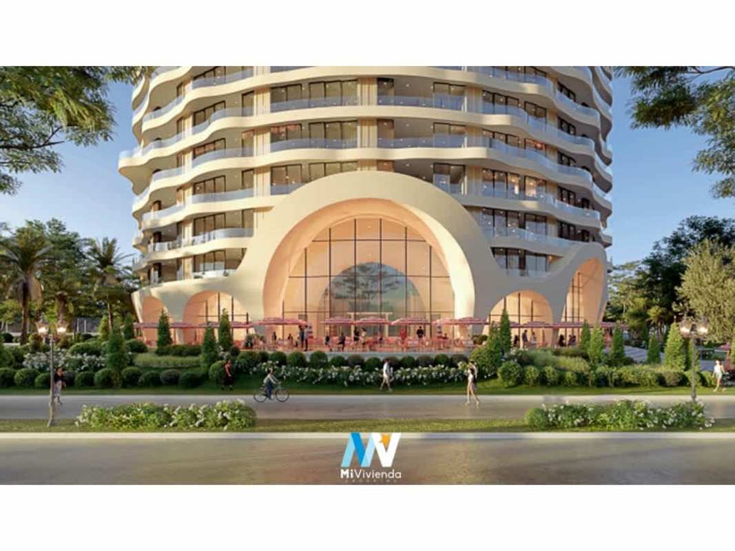 Luxury high-rise condo with curved balconies and landscaped entrance along Amador Causeway Panama