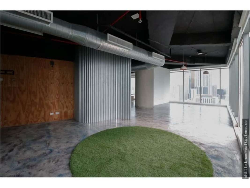 Industrial style open office with large panoramic windows in F&F Tower Calle 50 Panama City