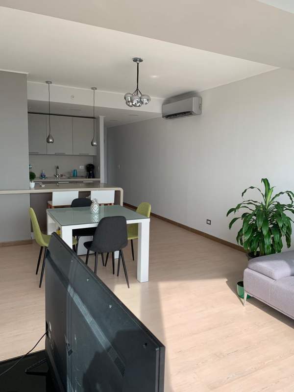 Furnished bedroom with floor to ceiling windows built-in closets AC Coco del Mar Panama