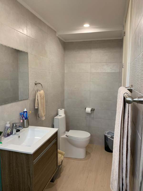 Second bathroom with glass door shower modern fixtures Coco del Mar Panama