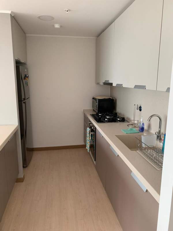 Kitchen with appliances modern design PH Quartier del Mar