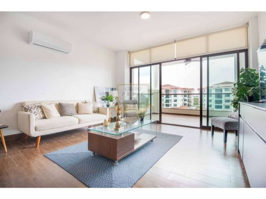 Modern entry leading to dining with wood floors and window Costamare Costa Sur Panama