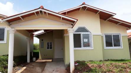 Security entrance house landscaped with palm trees Mystic City La Chorrera Panama