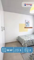 Modern playground equipment with swings slides inside Mystic City community Panama Oeste