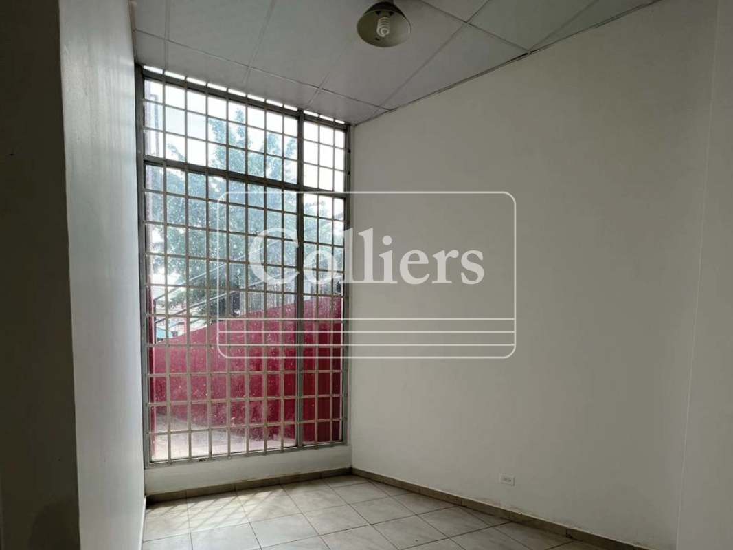 Small empty office with barred window tiled floors PH Mystic Park Juan Diaz Panama