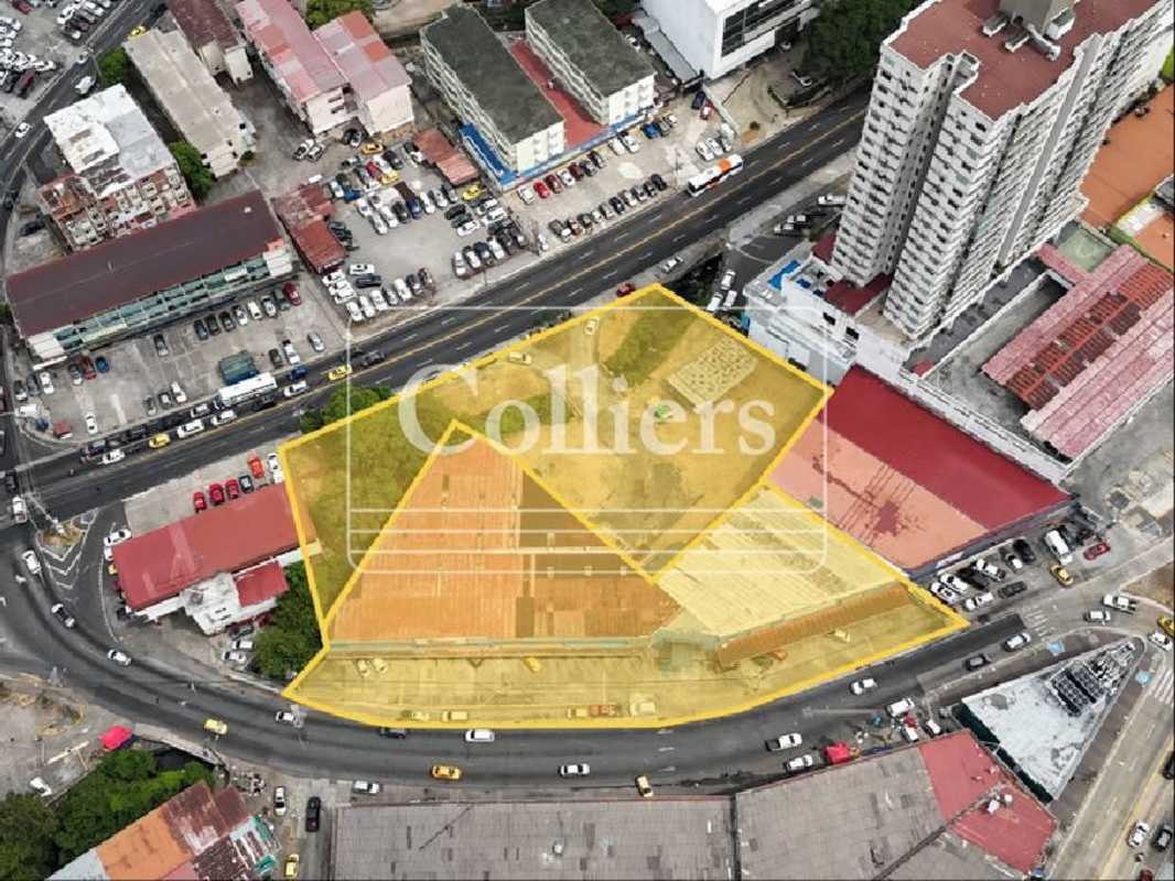 Urban aerial of strategic commercial property site outlined with high visibility on main roads in Panama