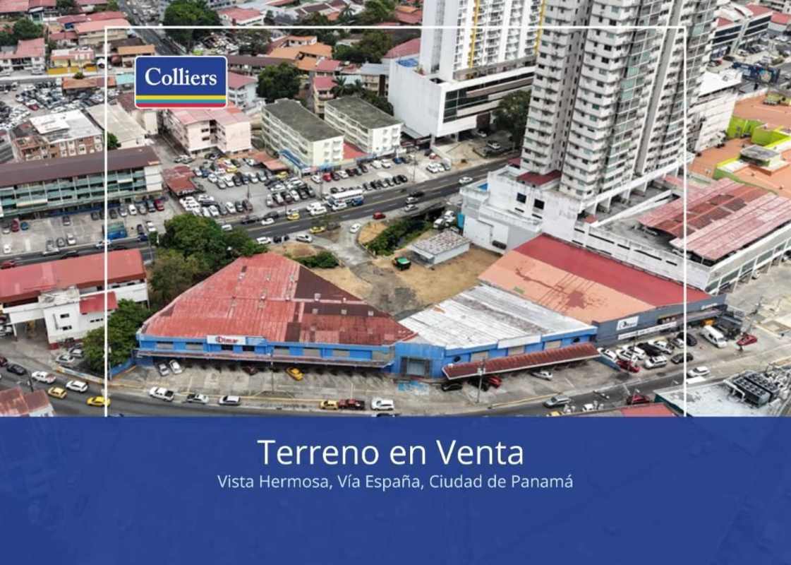 Urban aerial of commercial buildings and parking around large land parcel in Panama City for investment