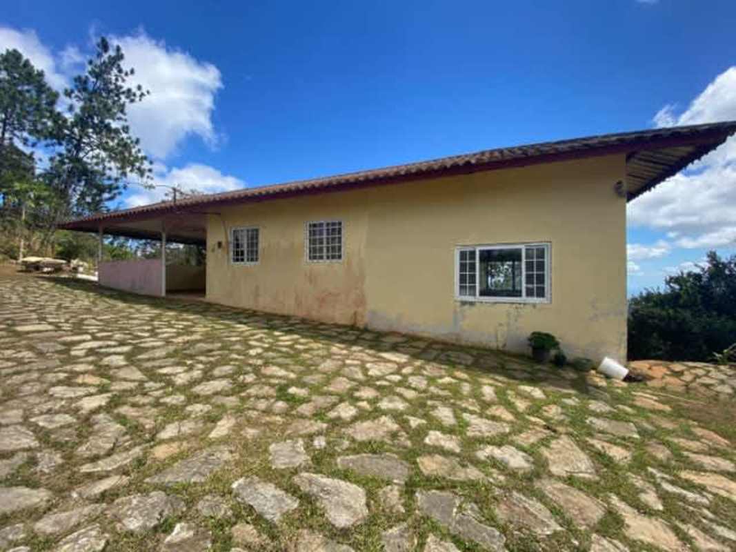 Natural waterfall cascading over rocks in lush forest sanctuary property in Cerro Azul Panama
