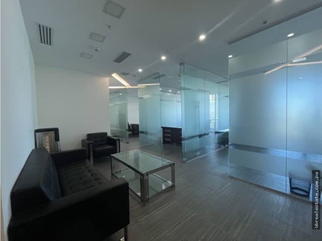 Reception lobby modern design glass walls black sofas in Financial Park Costa del Este