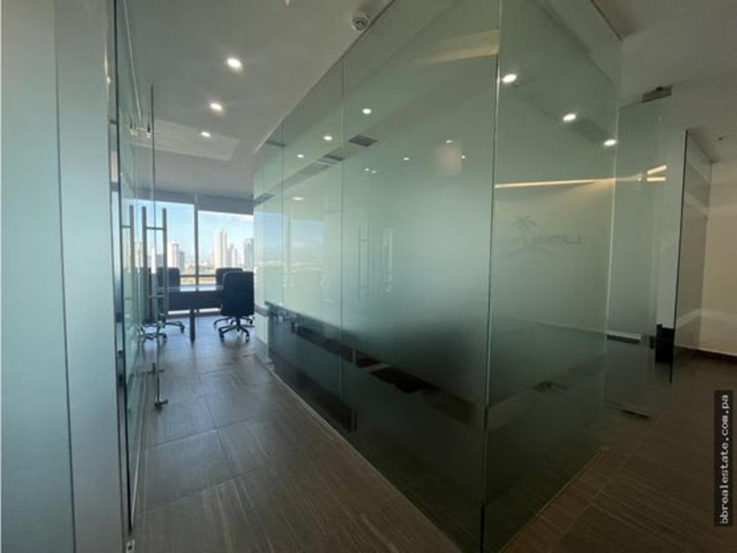 Modern private office with glass walls executive desk city view Financial Park Panama