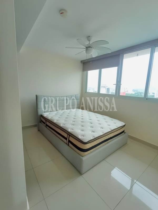 Laundry room with stacked washer and dryer at PH Midrise San Francisco Panama City