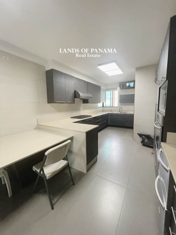 Modern spacious living room with city and ocean views in PH Ocean Park luxury condo Panama