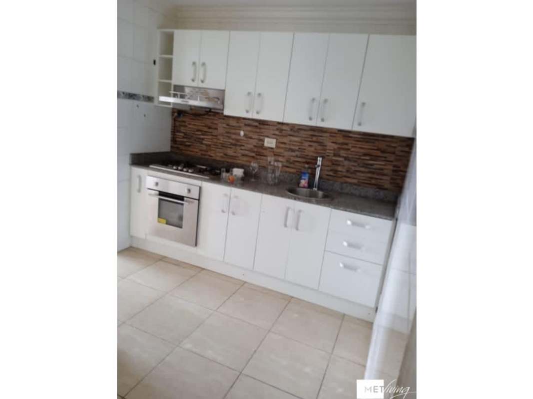 Remodeled kitchen with granite counters textured backsplash PH Parque Lefevre Panama