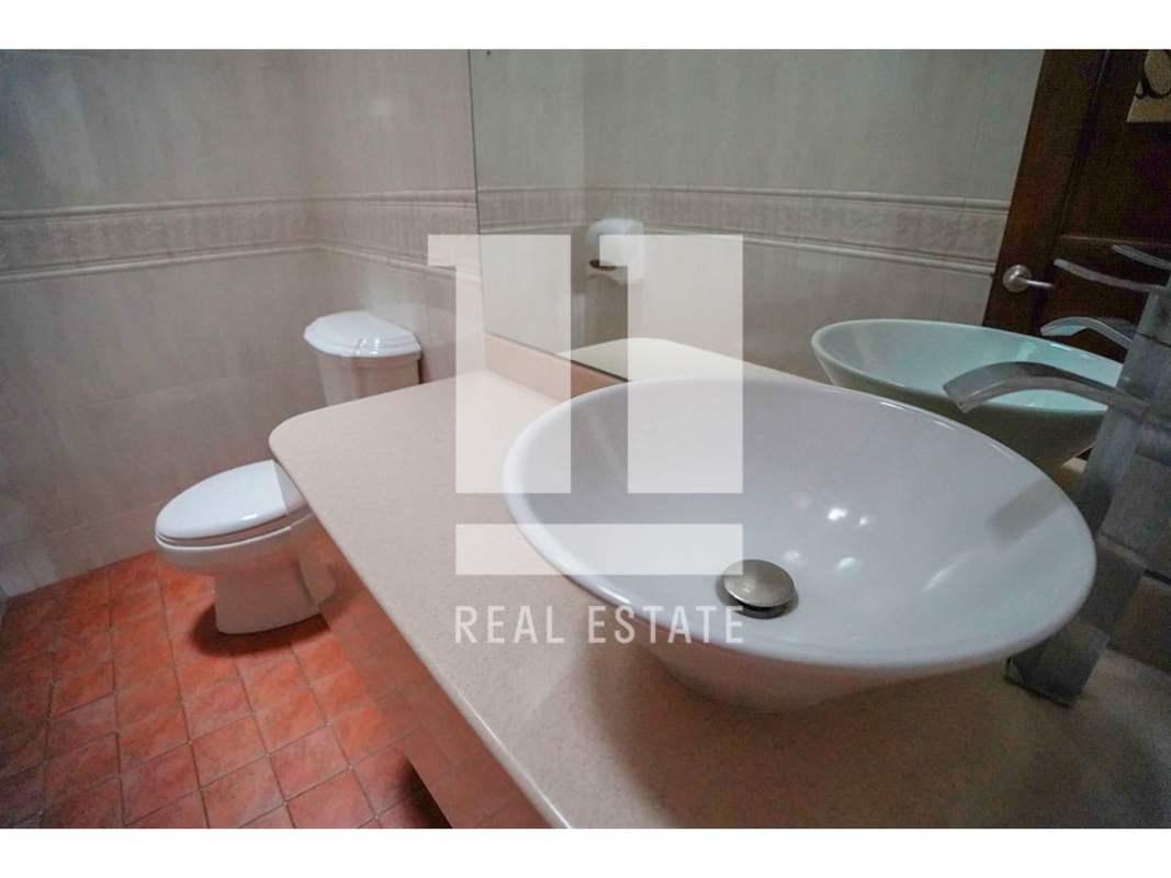 Industrial kitchen with ventilation tiled walls red floor for restaurant in Panama City commercial