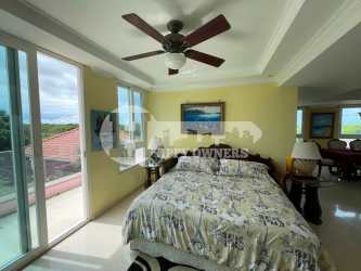 Bright bedroom with balcony, ceiling fan, tropical views Pink Palace Punta Chame Panama