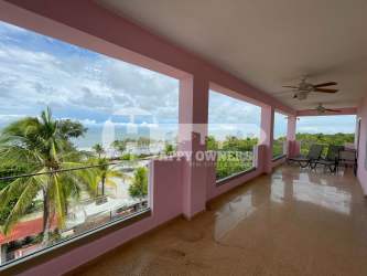 Multi-story pink Mediterranean style beachfront villa ocean view Punta Chame Panama