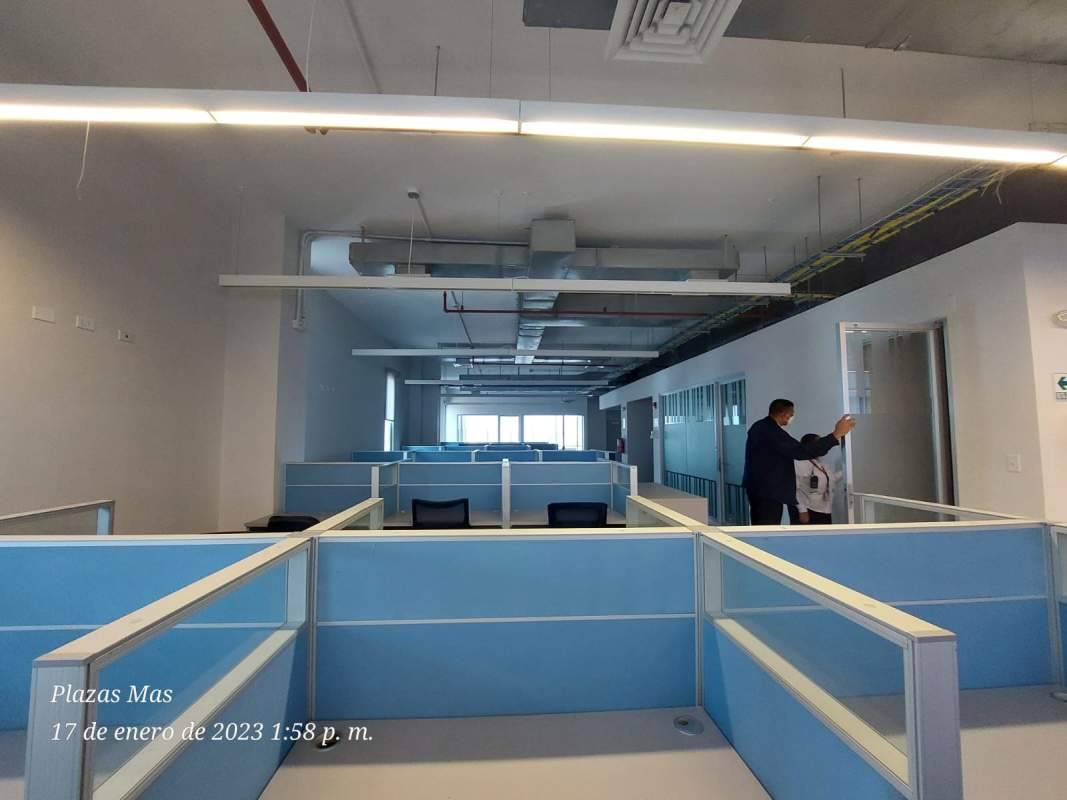Cubicles and open meeting spaces in PH Tula furnished office for rent Panama City