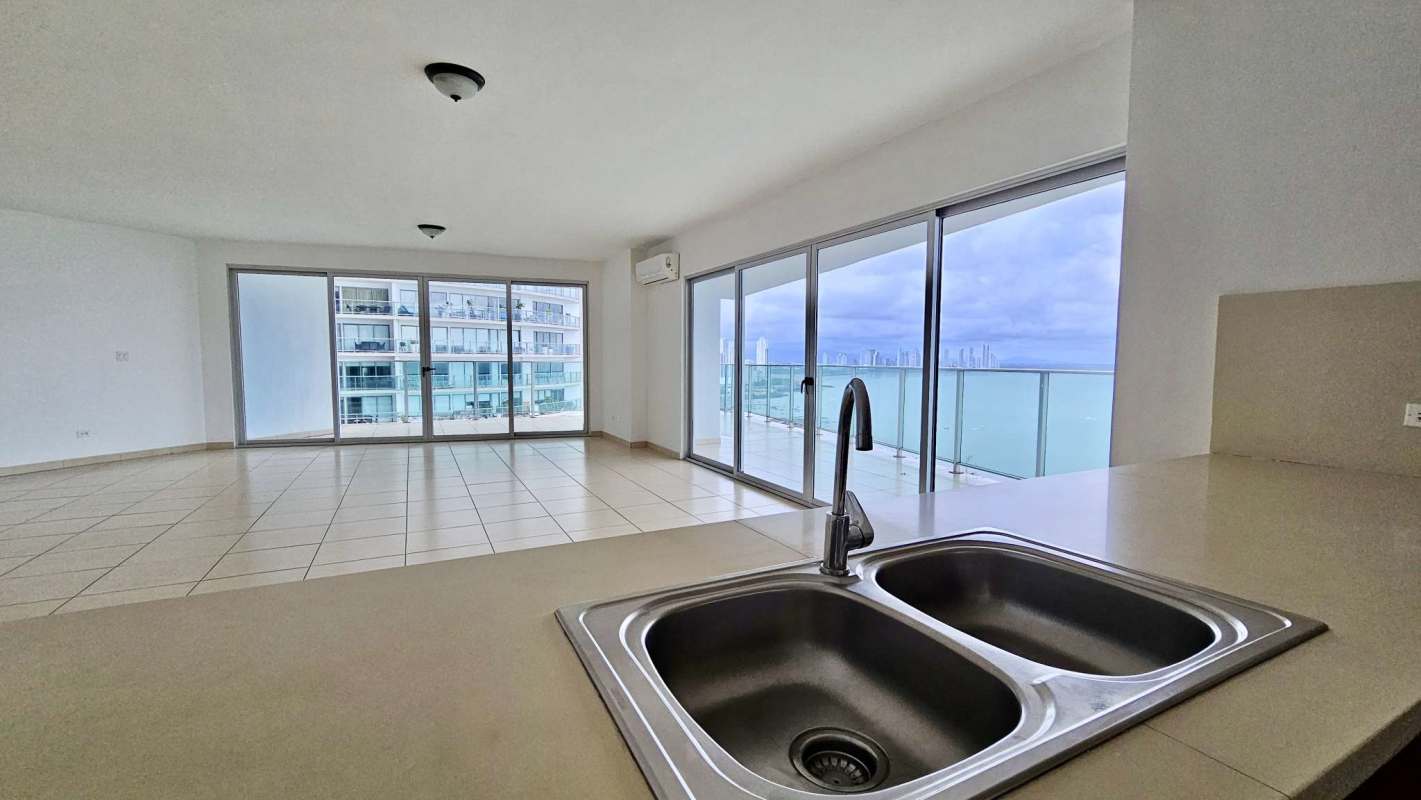 Open concept living area with access to oceanview balcony Oasis on the Bay Punta Pacifica Panama