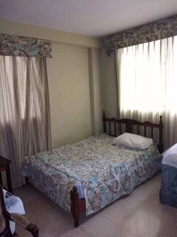 Large window bedroom built-in closet terrazzo floors PH Gina Obarrio Panama