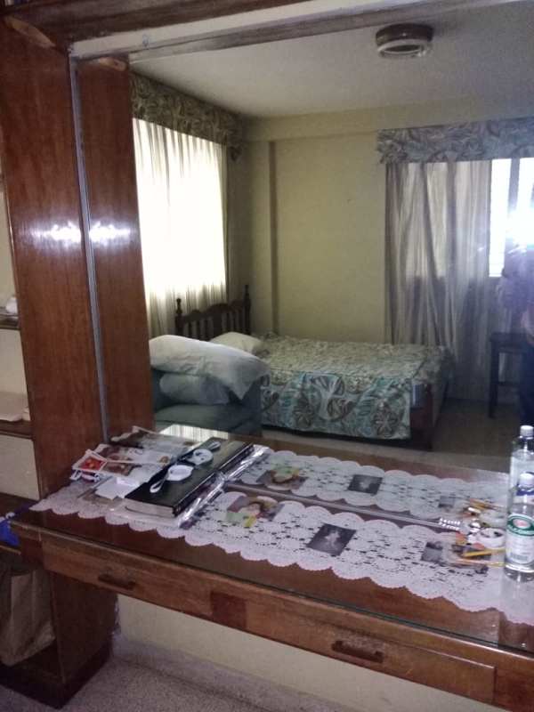 Library study room built-in bookshelves desk window PH Gina Obarrio Panama