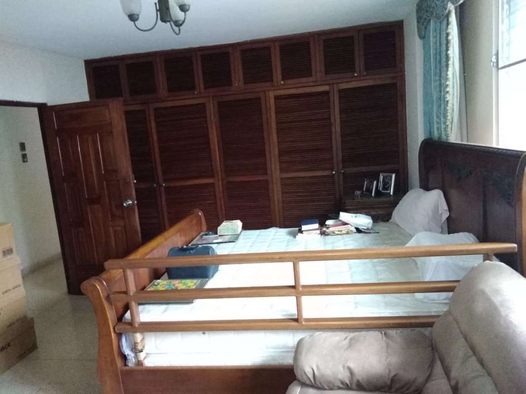 Bedroom wooden wardrobe large window Obarrio PH Gina Panama City