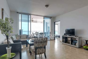 Sunlit master bedroom with large windows ocean views PH Terrazas de Farallón Panama