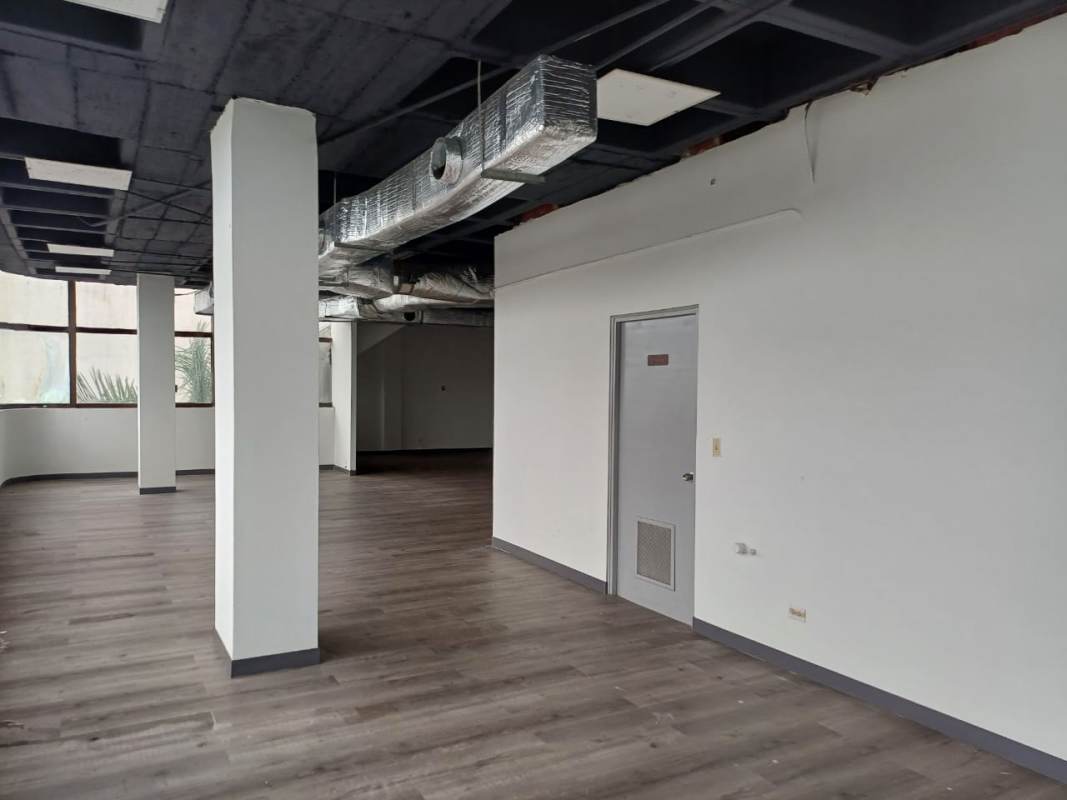 Industrial style office space with exposed ceiling, large windows in PH Torre BAC Avenida Balboa Panama