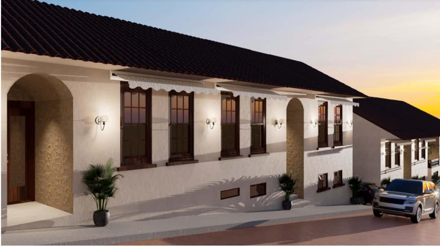 Outdoor dining patio with glass doors, spiral staircase entry at commercial plaza Casco Viejo