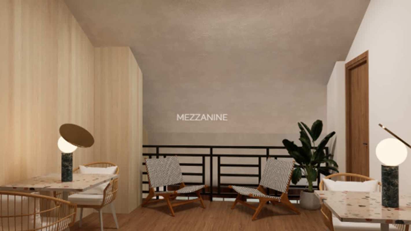 Colonial Mediterranean facade with arches, wooden windows, tiled roof in Casco Viejo commercial plaza