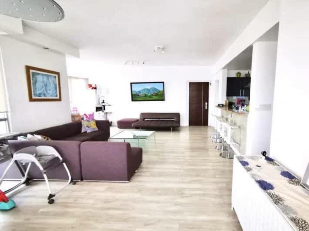 Spacious kitchen with granite countertop and appliances in PH Keops apartment Panama