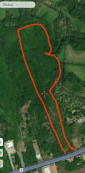 Aerial boundary outlined land near main highway and commercial areas in Divisa Panama