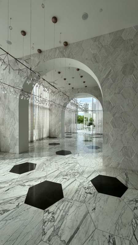 Rooftop terrace with sculpture, skyline view at PH Wanders and Yoo Panama