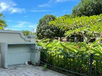 Lush tropical garden patio with paved outdoor space in Buenaventura beach community Panama