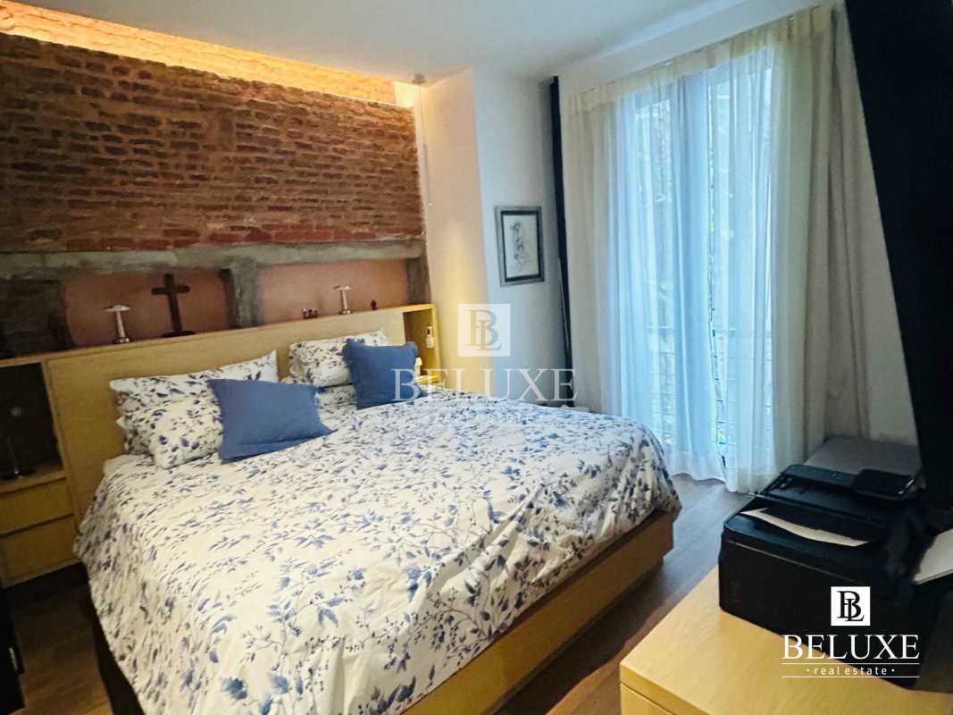 Open plan kitchen and dining area in furnished loft Casco Viejo PH Los Portales Panama