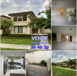 Large modern kitchen with granite countertop and appliances at River Valley Panama Pacifico