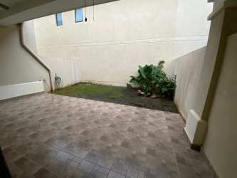 Contemporary Mediterranean-style townhouse exterior landscape in River Valley Panama Pacifico