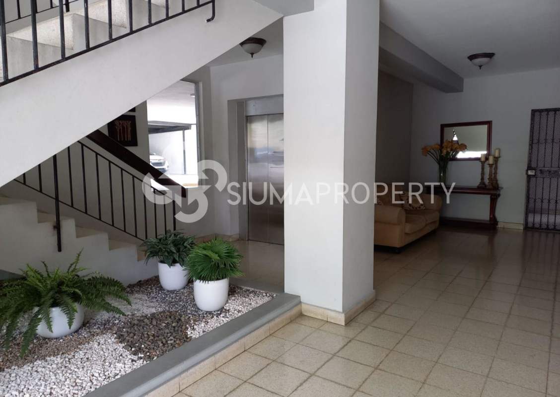 Lobby with sofa, elevator, stair access PH Santa Fe El Carmen Panama City