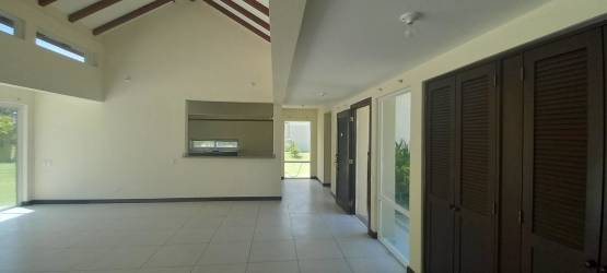 Bright kitchen with tile floor, modern cabinetry, natural light in Costa Blanca villa Panama