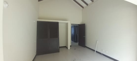 Modern minimalist kitchen with window overlooking garden Costa Blanca Golf Villas Panama