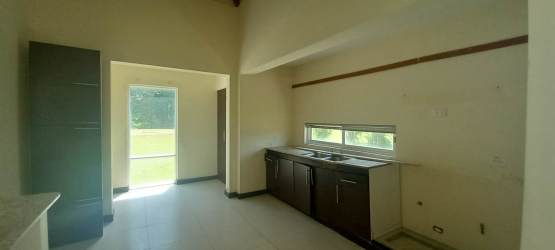 Bedroom with high vaulted ceiling built-in closet and garden views in Costa Blanca villa Panama