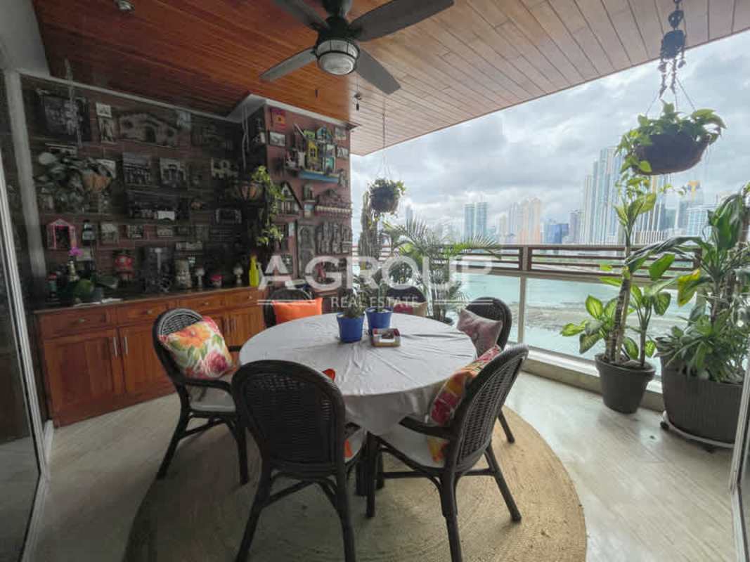 Balcony dining area with ceiling fan city and sea view PH Peninsula Punta Paitilla Panama City