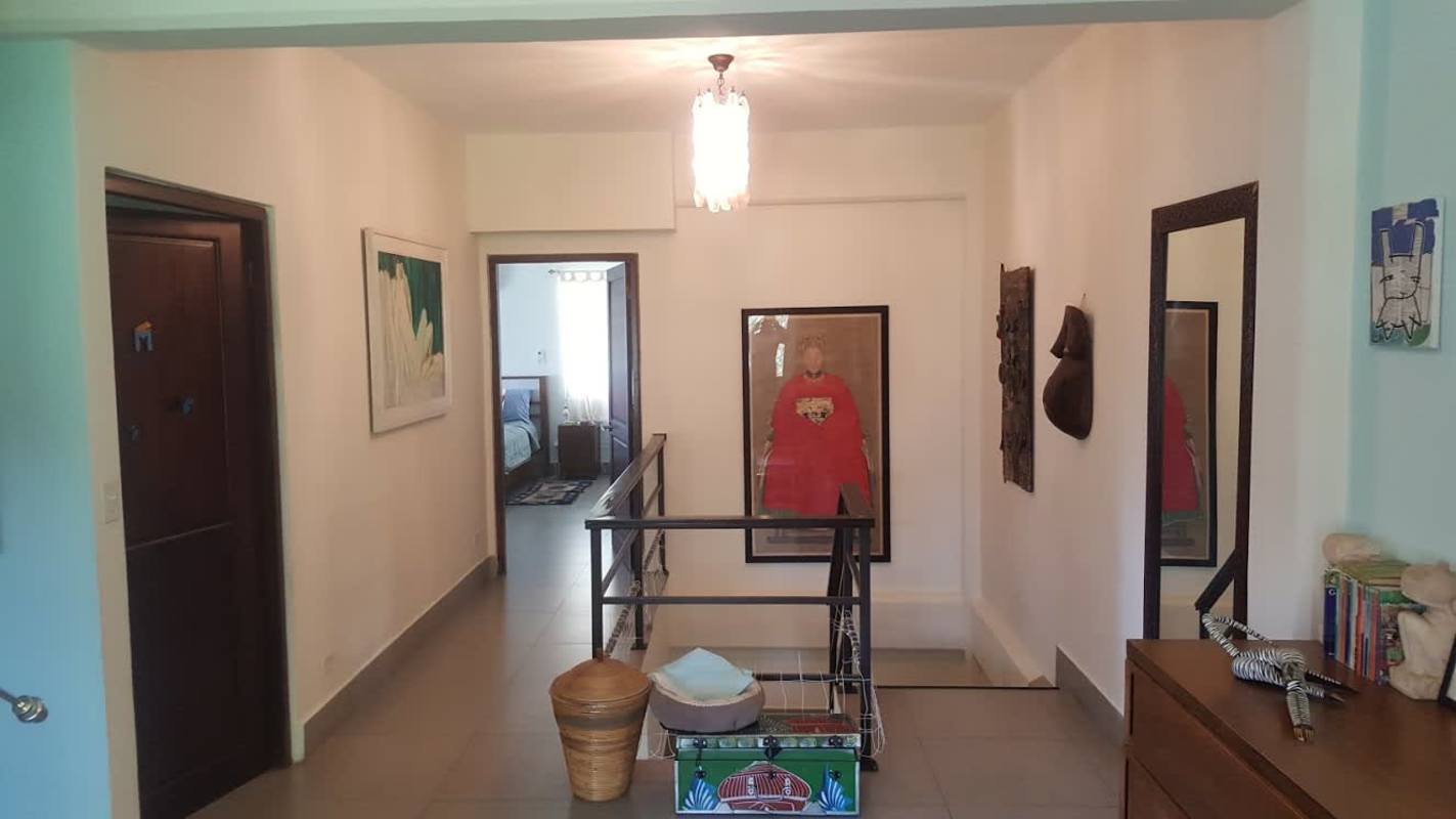 Bedroom with frosted closet doors, tile floor, balcony access Clayton Panama house