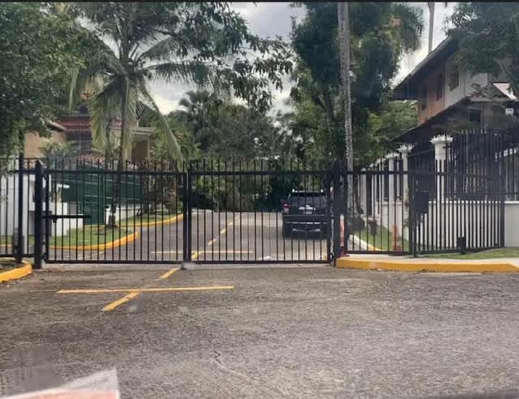 Secure gated entrance to Clayton Village residential area Panama City