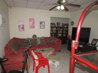 Mediterranean-style covered porch with columns urban house for sale Santiago Panama