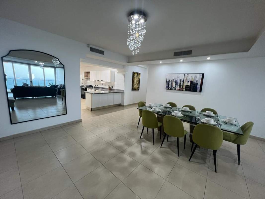 Elegant master bedroom with ocean view and en suite bathroom in Waters on the Bay Panama