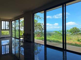 Modern kitchen with island and premium appliances in home for sale Penonomé Panama