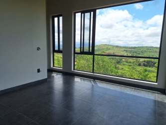 Countryside and wind farm views from balcony terrace Santa Cruz Penonomé Panama